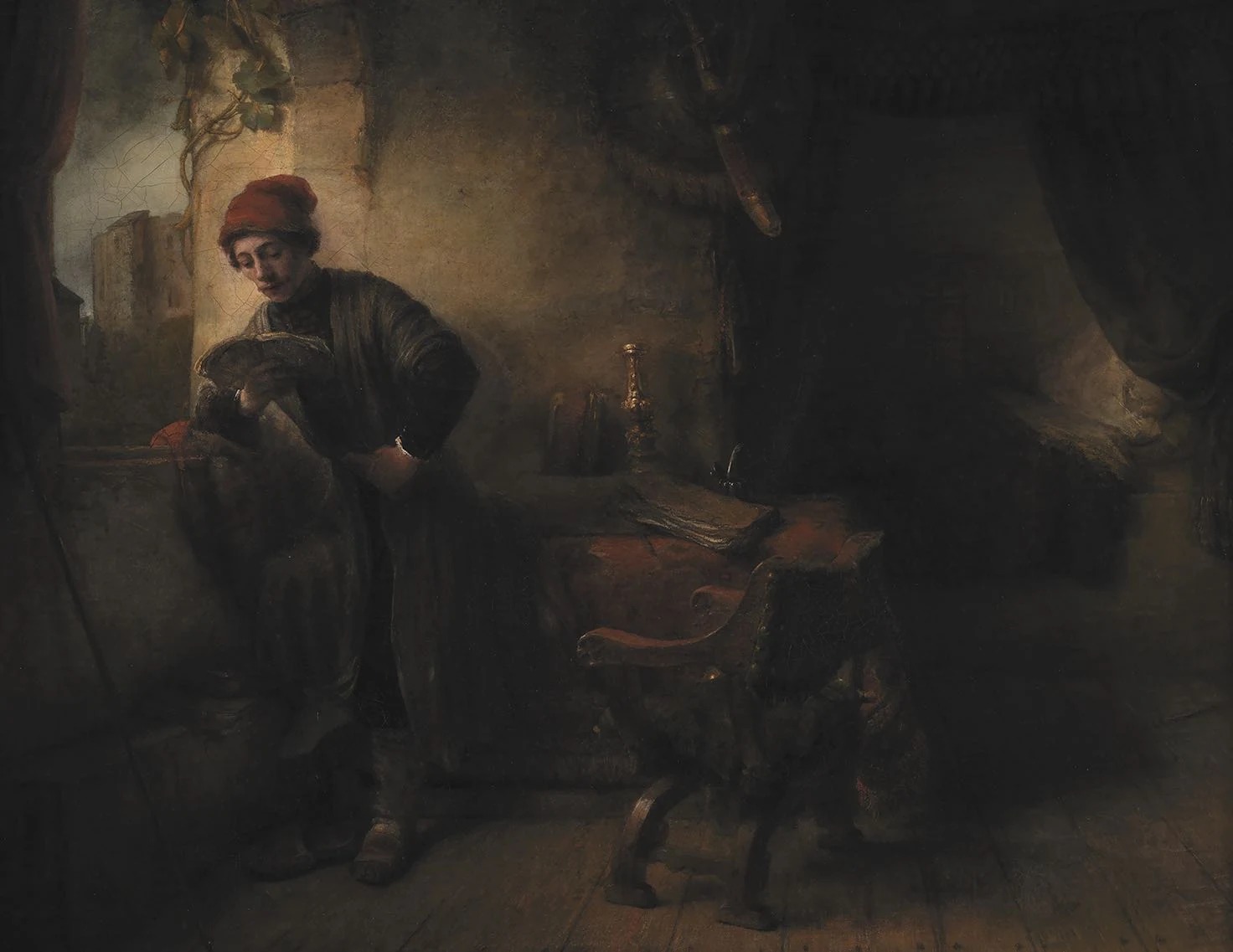 Standing Young Man at the Window in His Study Reading